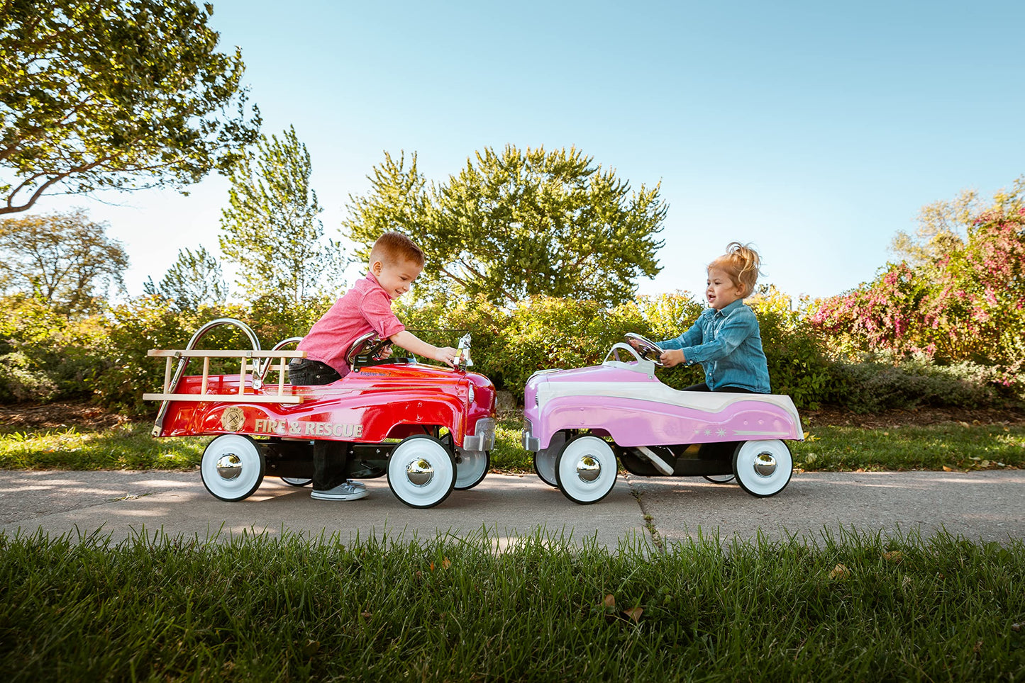 Kid Trax pink pedal car, steel frame, vintage style ride-on for kids 3–5.
